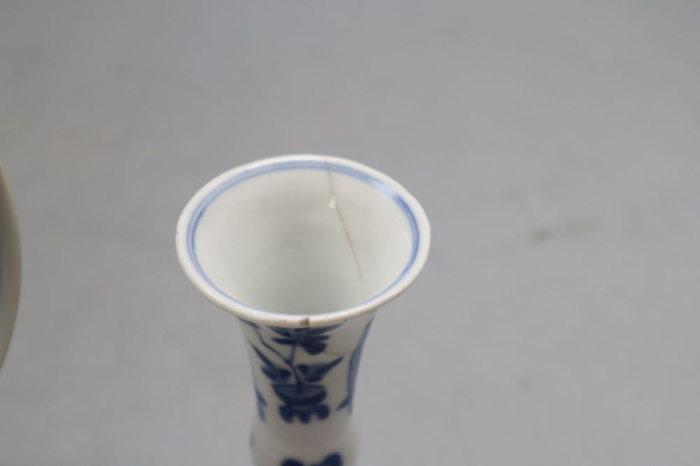 A Chinese blue and white vase and a dish bearing a Qianlong mark, diameter 11.5cm